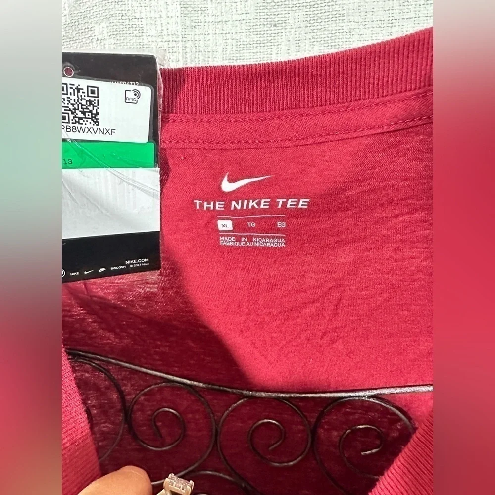 The Nike Tee burgundy long sleeve with camo logo size XL